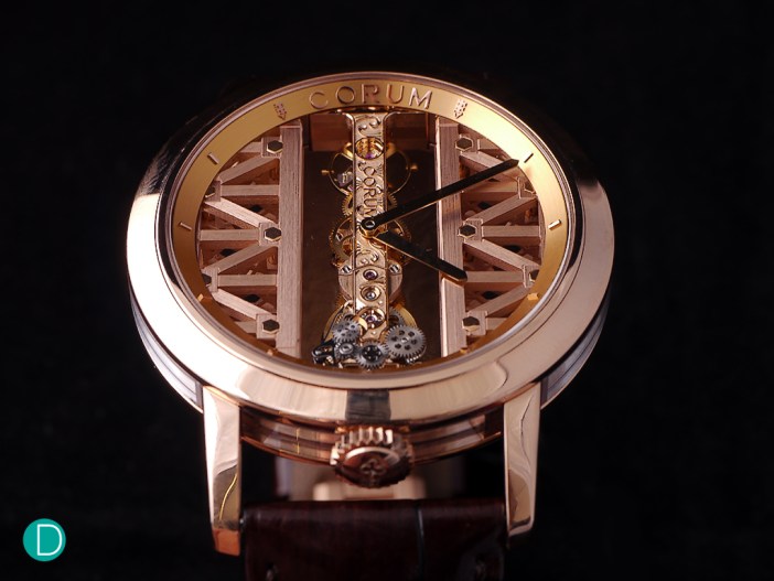 Corum Golden Bridge Round in red gold, in a red gold case, red gold movement plates.