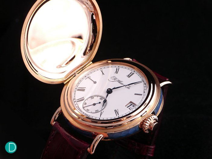 And when the front cover is open, you will be greeted by the beautiful enamel dial on this timepiece.
